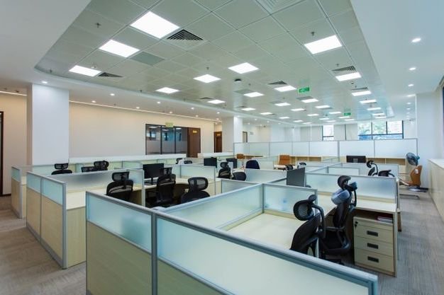 A refurbished open-plan office with desks and partitions